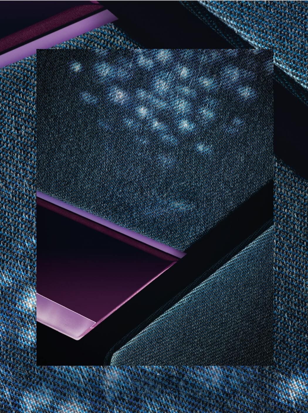 The aesthetically pleasing interplay of different structures in this design study is enhanced by a lively play of light that shimmers through the textile covering of the center console.