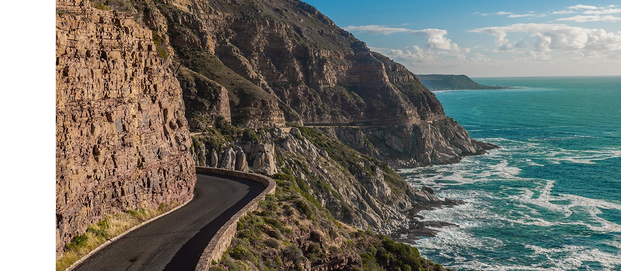 A Convertible Car Road Trip beneath Chapman’s Peak, South Africa